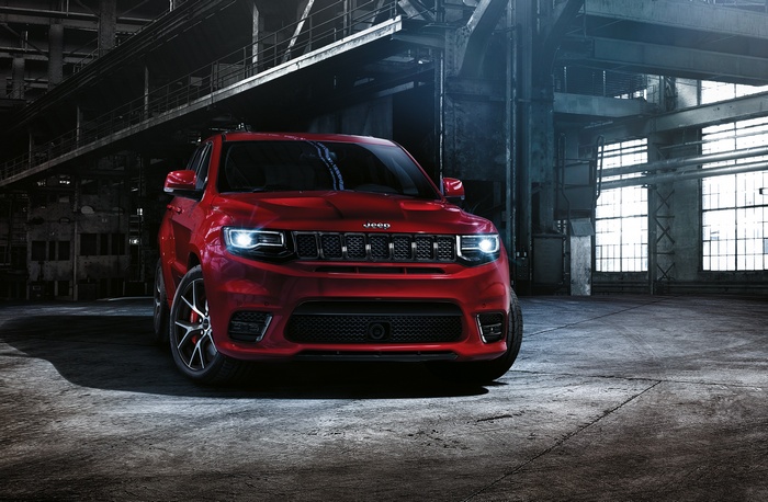 Red Jeep Grand Cherokee SRT in industrial building