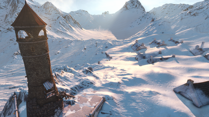 Snowy mountain valley with a stone tower and ruins