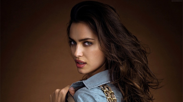 Irina Shayk wearing a denim shirt