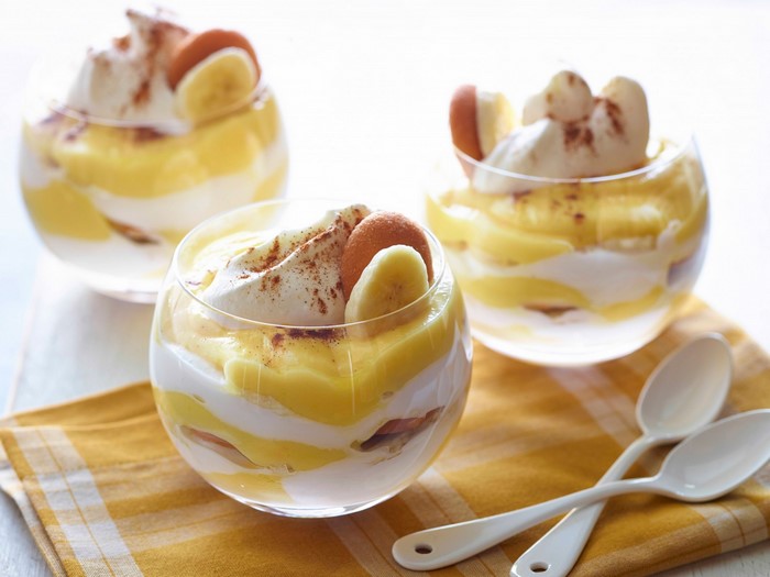 Banana pudding parfaits with whipped cream and vanilla wafers