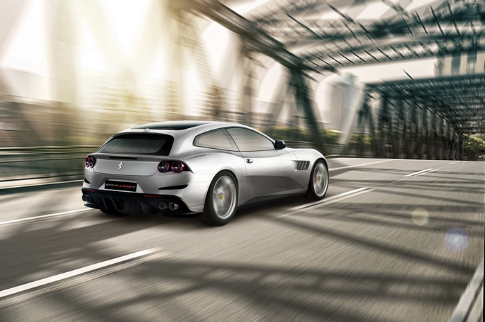 Silver Ferrari GTC4Lusso T driving on a bridge