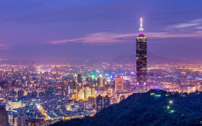 Taipei 101 skyscraper in Taipei cityscape at night