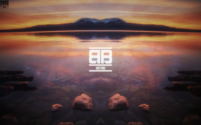 Sunset reflection over water with mountains and logo