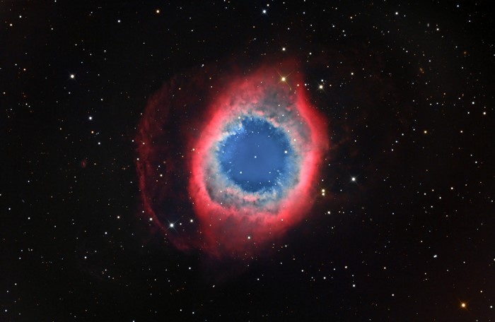 The Helix Nebula in space with stars
