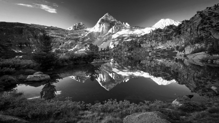 Mountain reflection in a lake, black and white landscape