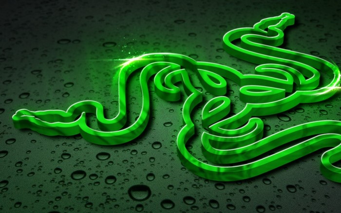 Razer logo on a wet dark green surface