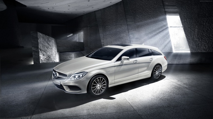 White Mercedes-Benz CLS Shooting Brake in concrete structure