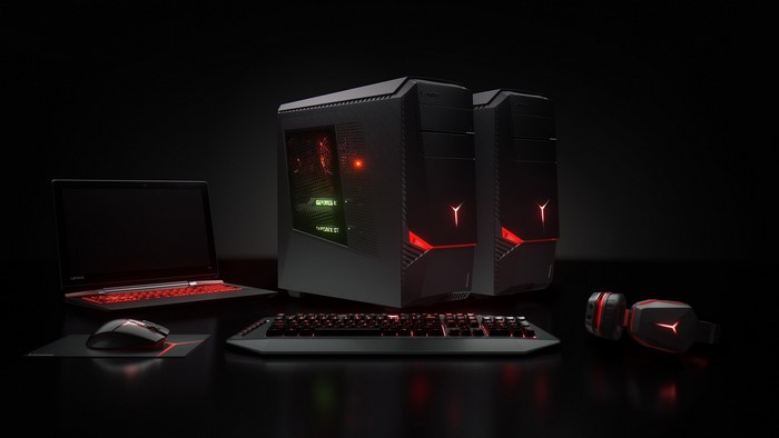 Lenovo Gaming PC setup with laptop, keyboard, mouse, and headphones