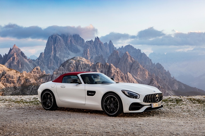 White Mercedes-AMG GT C Roadster with Red Top in Mountains