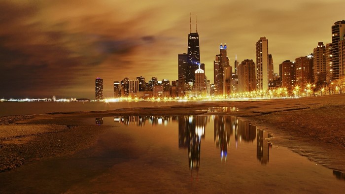 Chicago skyline at night with reflections
