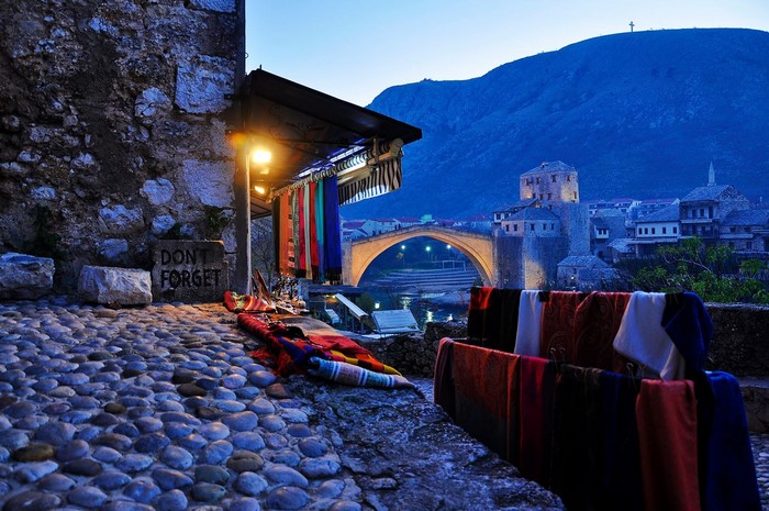 Mostar Old Bridge at Dusk with Market Stalls