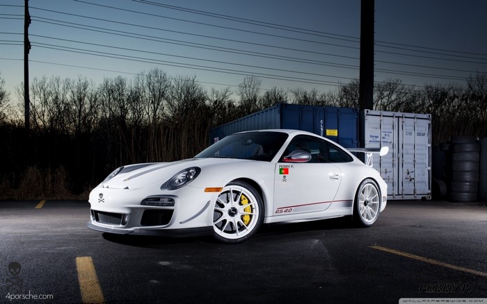 White Porsche 911 RS 40 with racing decals