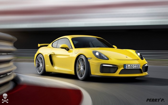 Yellow Porsche Cayman GT4 on a race track