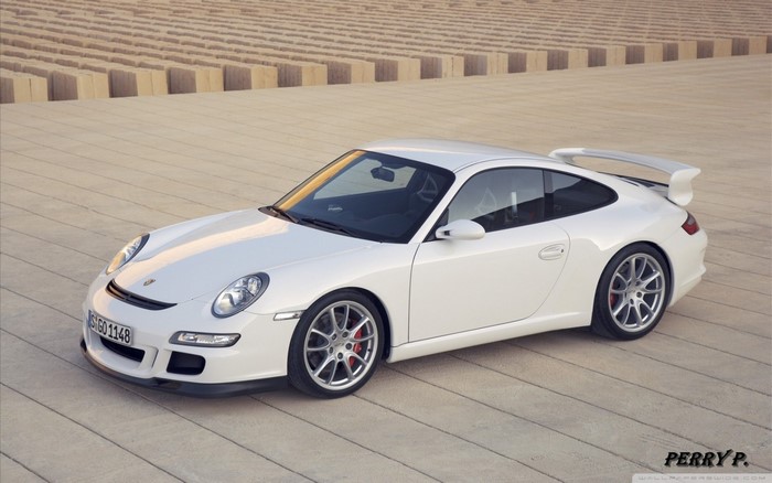 White Porsche 911 GT3 parked on a paved surface