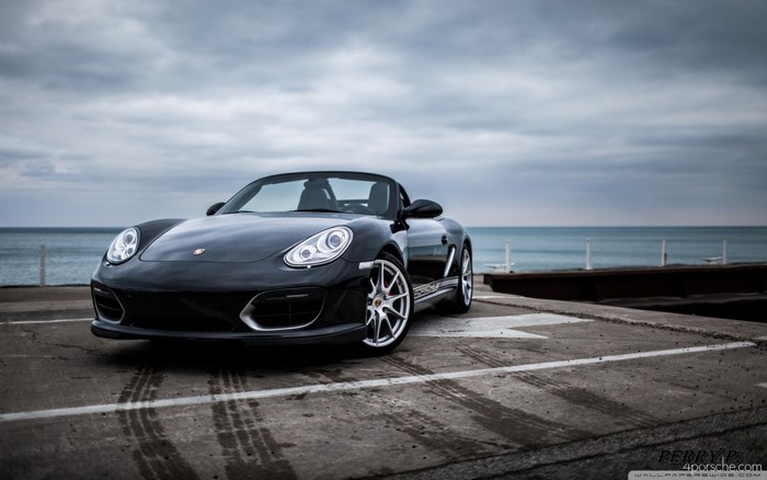 Black Porsche Boxster Convertible by the Sea