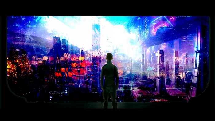Man looking at a futuristic city at night