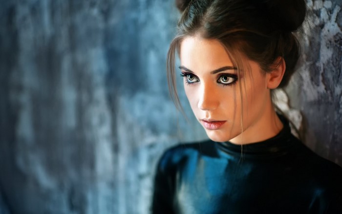Portrait of a Woman with Striking Eyes and Dark Hair