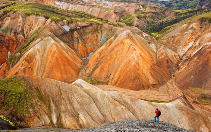 Photographer in colorful Rhyolite Mountains