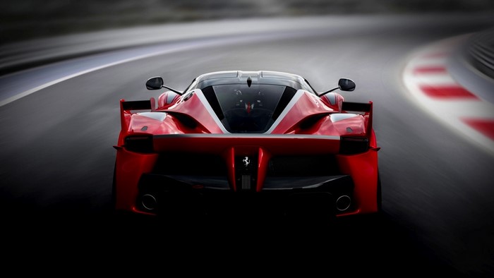 Red Ferrari FXX K race car on a track