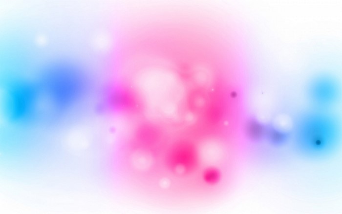 Abstract colorful bokeh circles with pink and blue hues