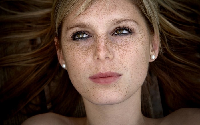 Close-Up Portrait of Freckled Woman with Brown Hair