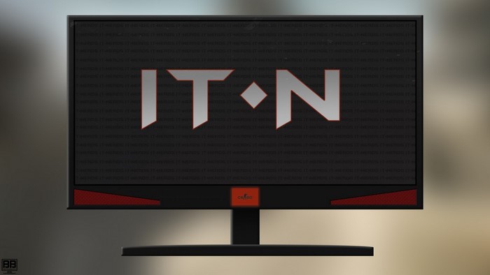 IT N logo on a computer monitor with CS:GO branding