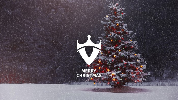Merry Christmas with a decorated tree in the snow