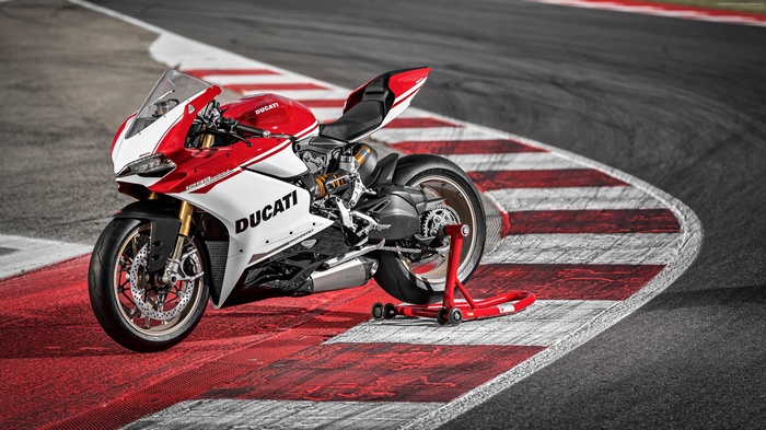 Red and White Ducati 1299 Panigale S Superbike on Racetrack