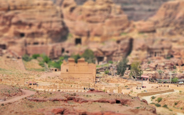 Ancient ruins and sandstone cliffs in Petra, Jordan