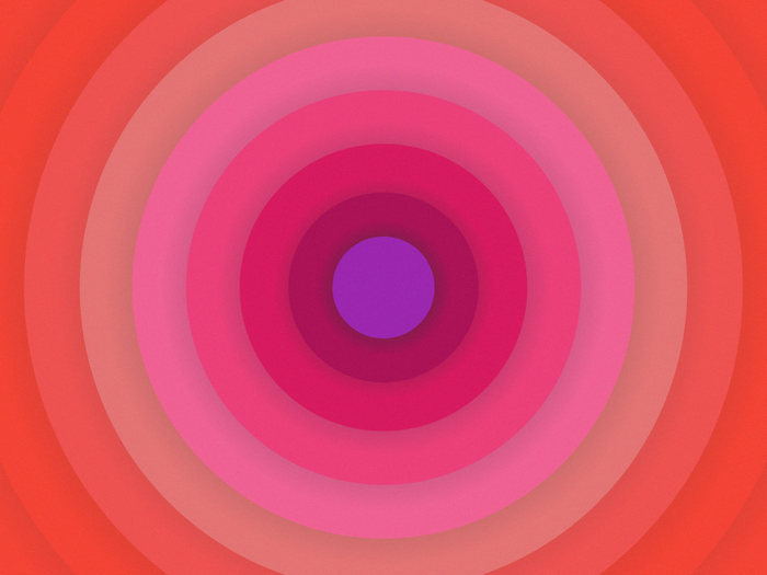Concentric circles in shades of pink and red