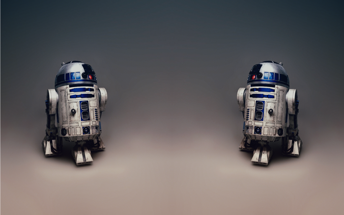 Two R2-D2 droids from Star Wars
