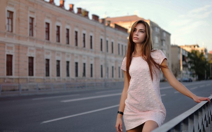 Karina Bogdan Ross in a pink dress on a street