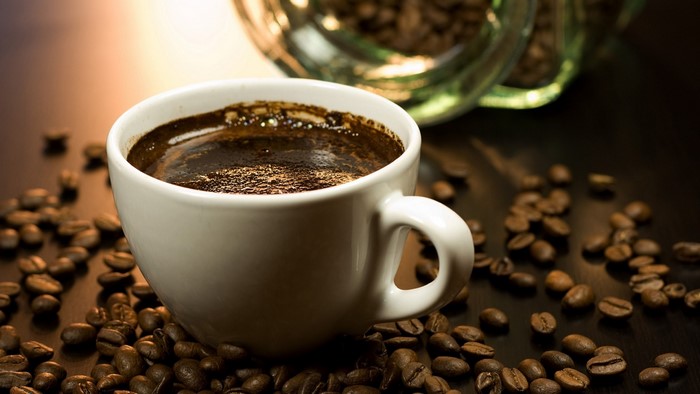 Cup of Turkish coffee with coffee beans