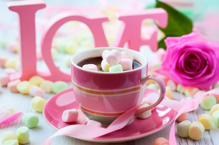 Hot chocolate with marshmallows and a rose for Valentine's Day
