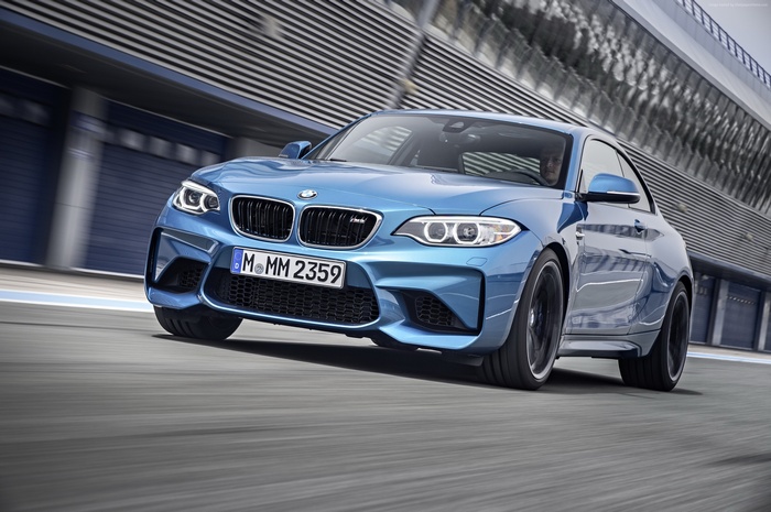 Blue BMW M2 Coupe on a Racetrack