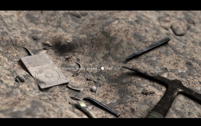 Apple iPod historic music player on rocky ground