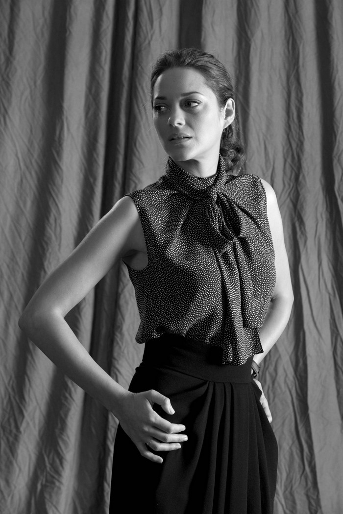 Marion Cotillard in a black and white portrait