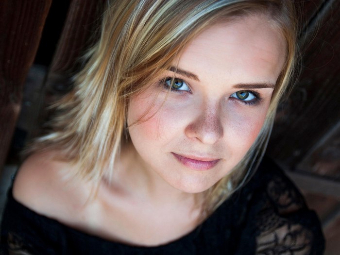 Close up portrait of a young woman with blonde hair
