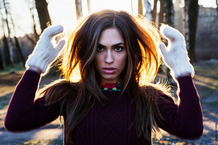 Woman with gloves in sunlight