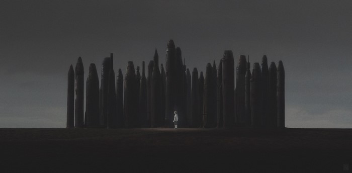 A child stands before a dark, monolithic city.