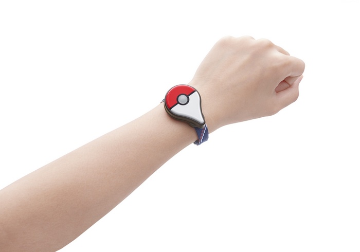 Pokemon Go Plus accessory on a wrist