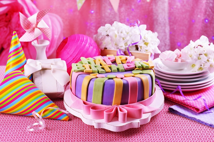 Birthday cake with party decorations
