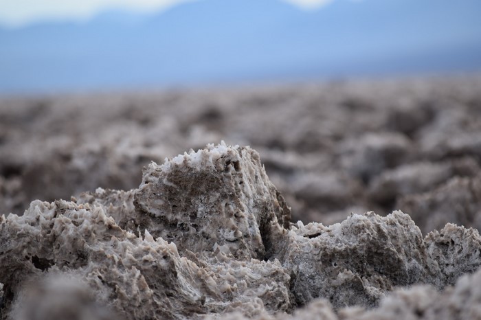 Salt flats with mountains in the background