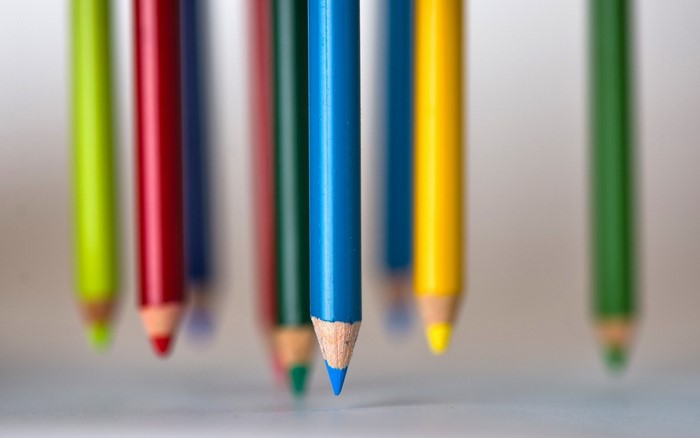 Colored pencils suspended in air