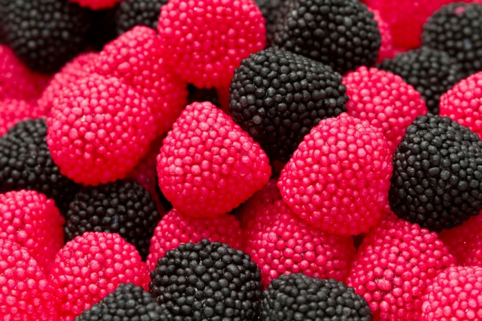 Close-up of red and black berry candies