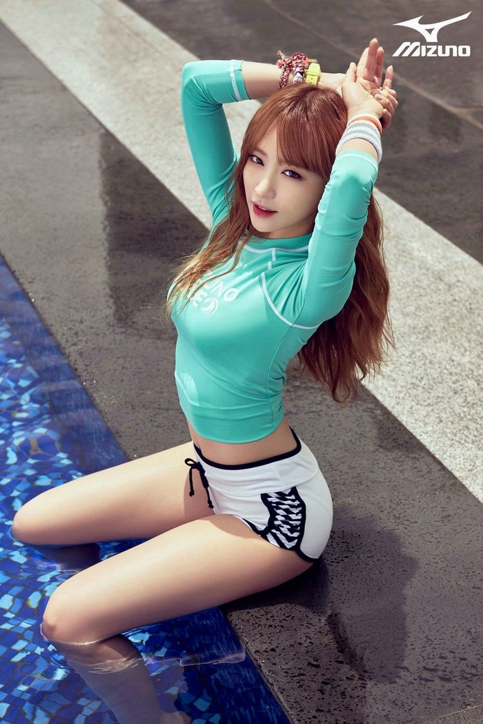 Woman in Mizuno swimwear by pool