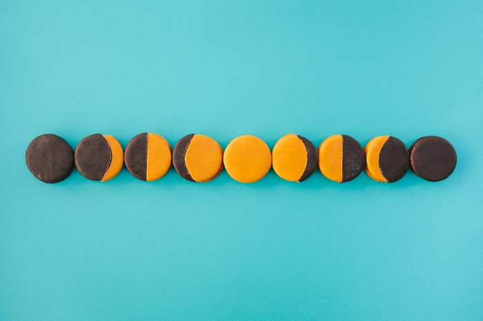 Moon phase cookies on blue background