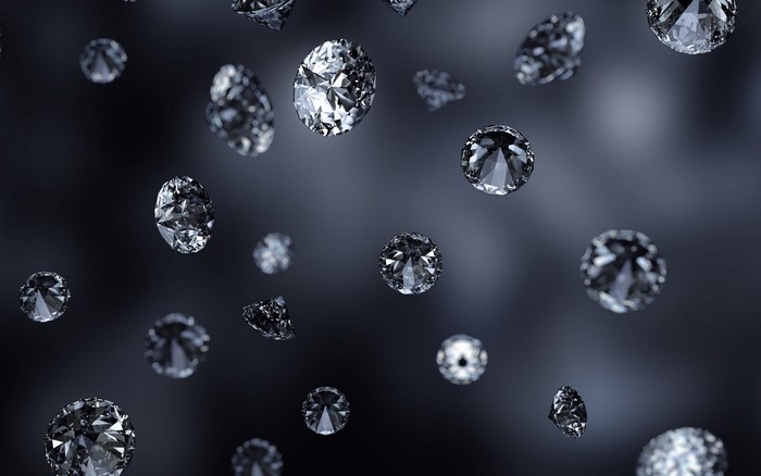 Scattered diamonds on a dark background