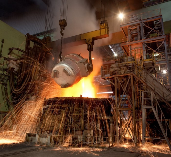 Molten metal being poured in a factory
