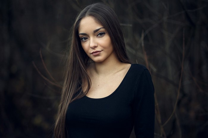Merisa, a woman with long brown hair, portrait